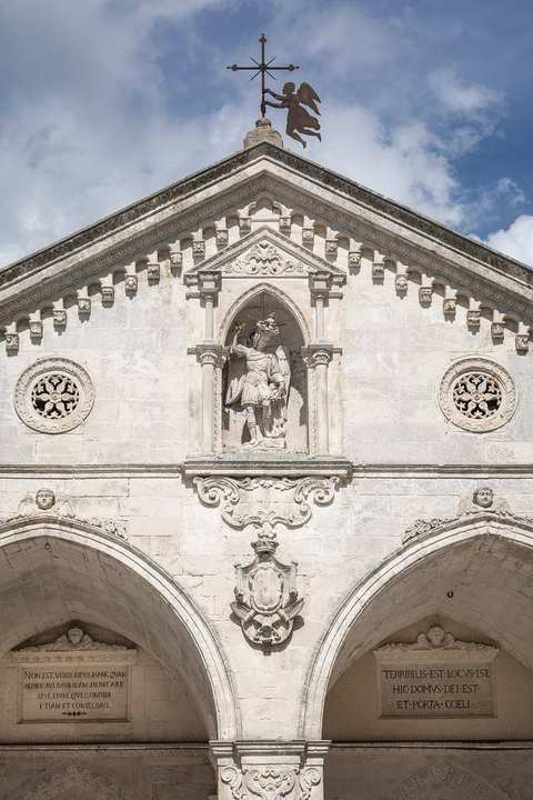 Another view of the sanctuary buildings over the cave.
