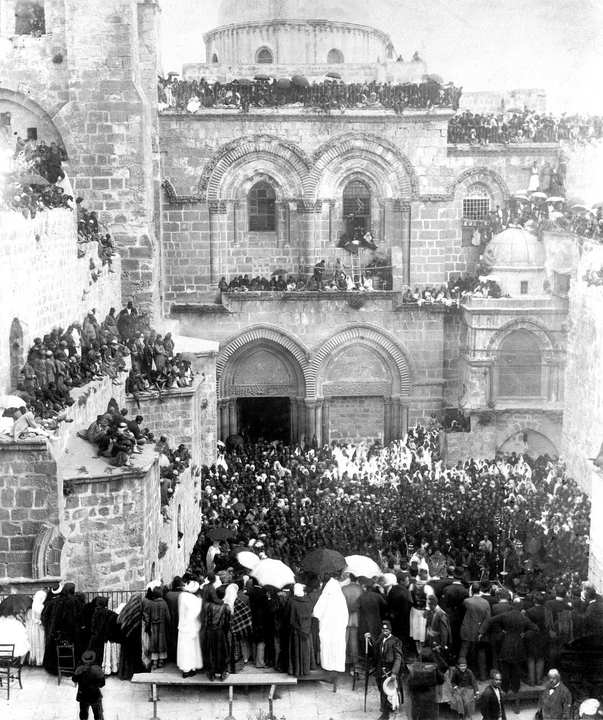 The same church in a nineteenth-century photograph, before the modern square was opened out.