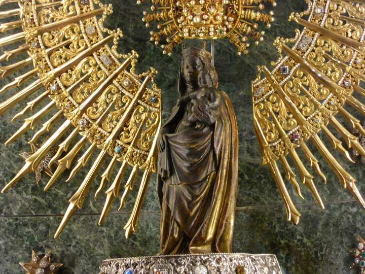 Our Lady of the Pillar — Caesaraugusta (Zaragoza). A small standing Madonna and Child on a jasper pillar, as they are venerated in the basilica at Zaragoza.